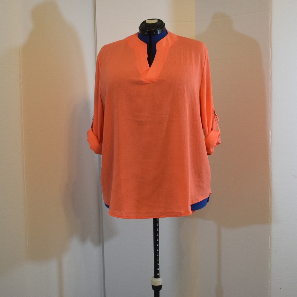 Light orange tunic shirt. size XXL